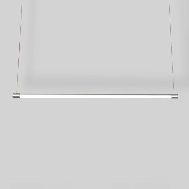 Silver-ended tubular pendant with white-looking light against a grey background