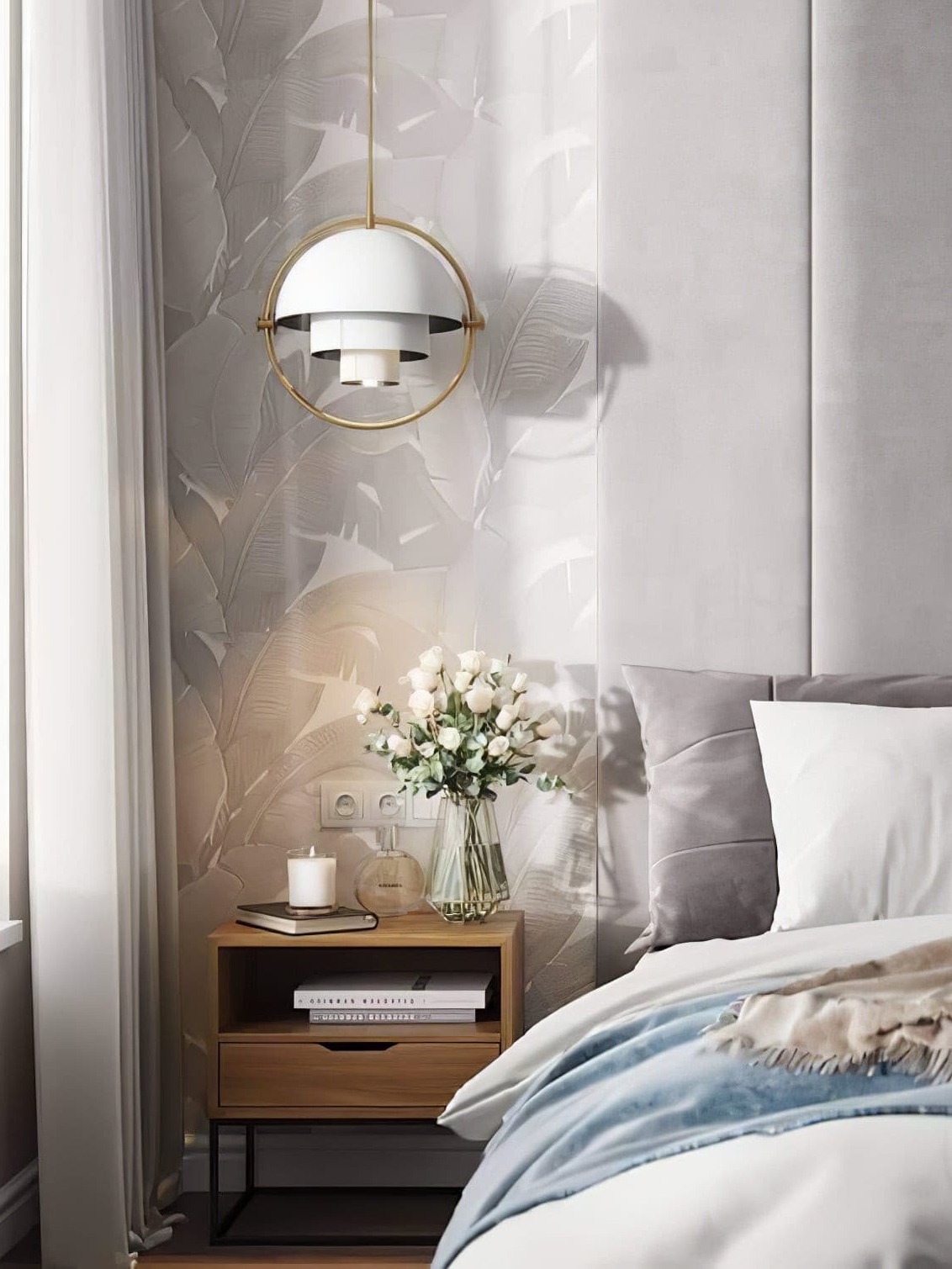 White dome pendant beside a bed and flowers