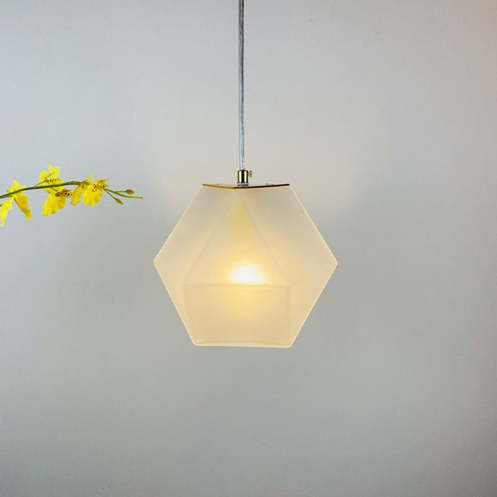 Hailie White angular glass pendant with a visible glow
