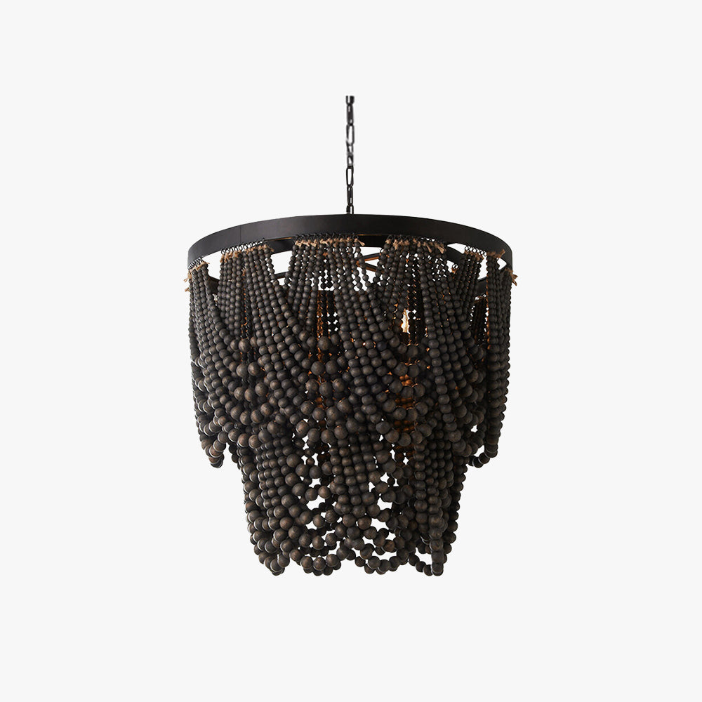 Dark wooden bead drapes beneath black pendant ring
