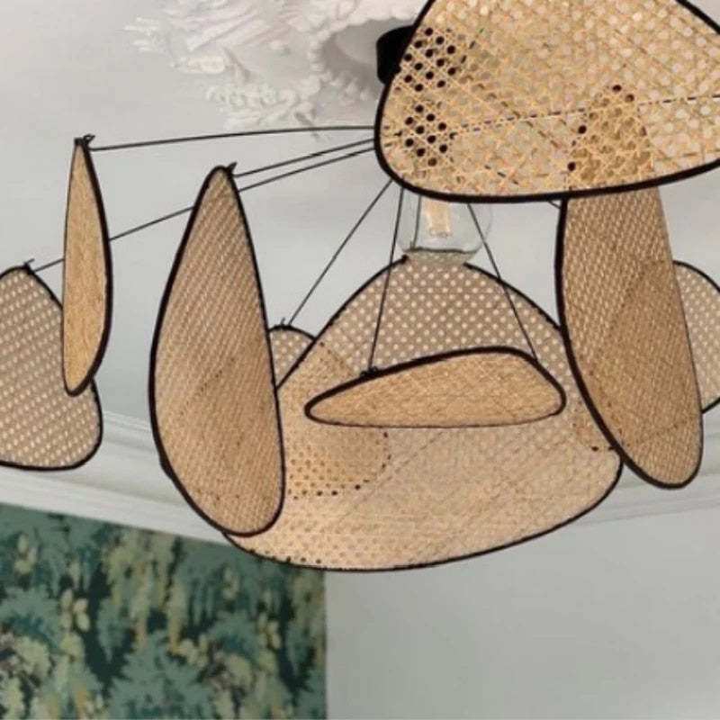 Close view of woven rattan leaves and central visible bulb