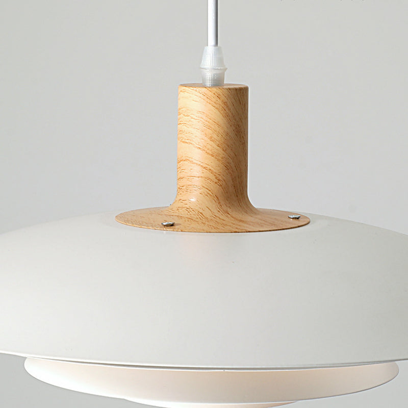 Close view of wood-grain-look collar and white metal shade