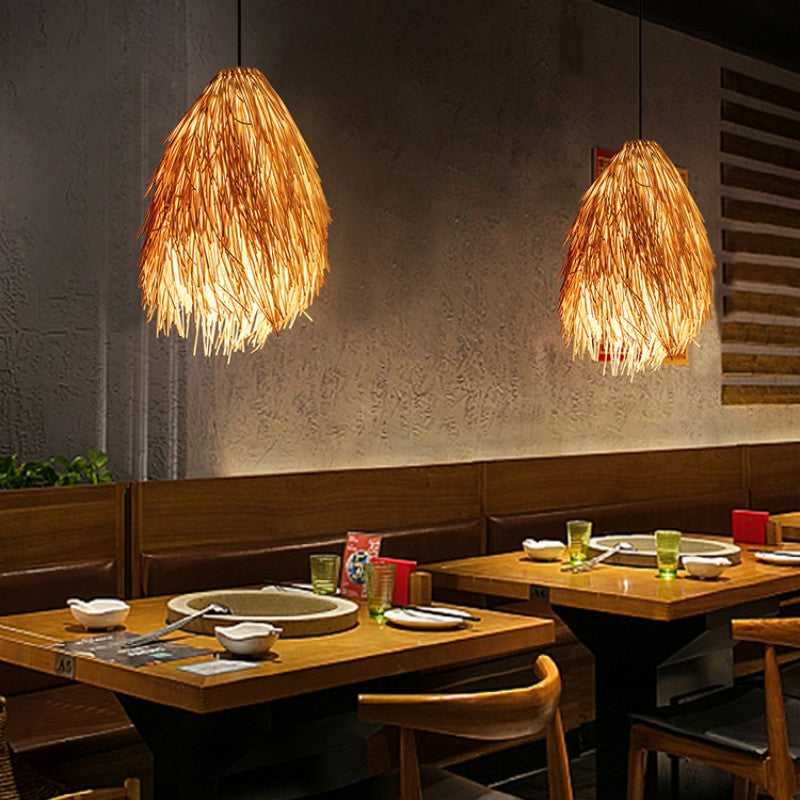 Muto rattan pendants illuminating indoor dining tables.