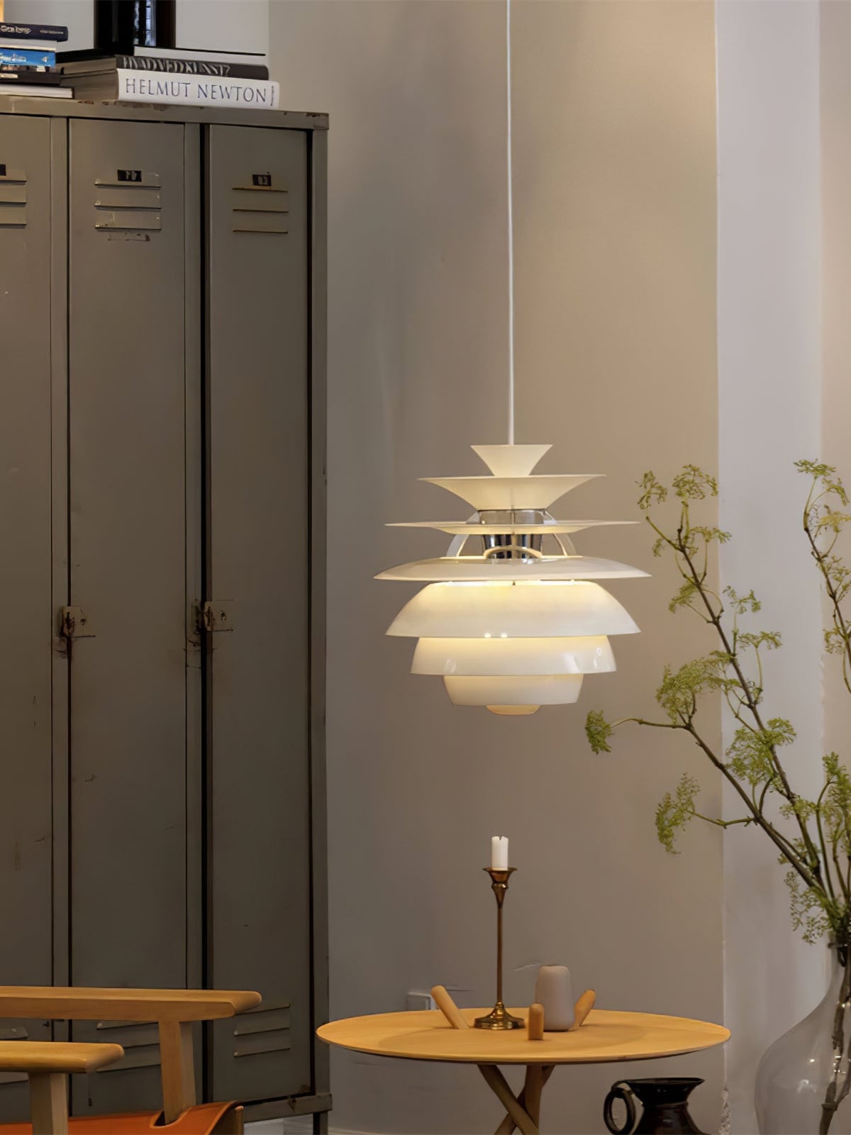White tiered Snowball pendant above a small round table