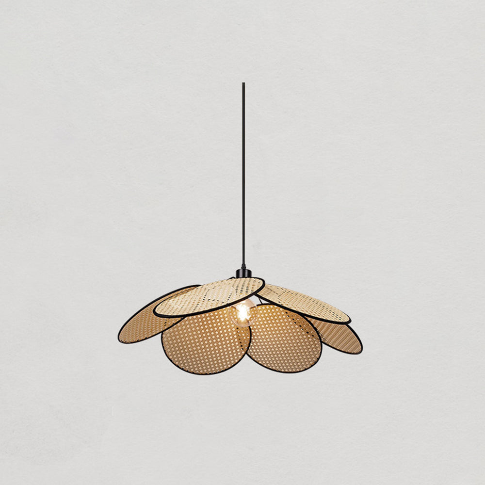 Lit black-trim woven flower pendant with full suspension cord against a pale gray background