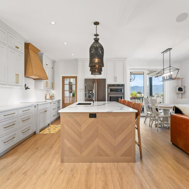 Single black woven pendant above a kitchen island