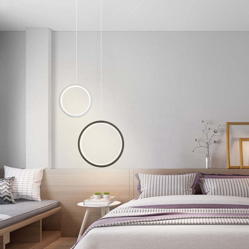 Circular pendants above sofa in bright room