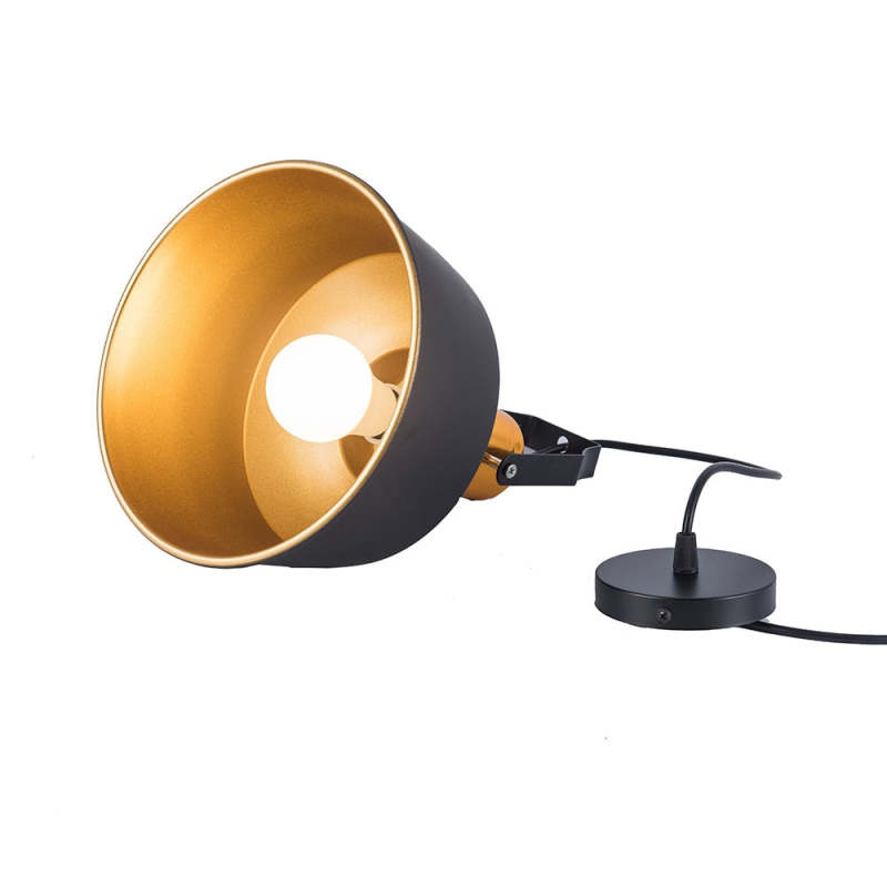 Side-laid black dome pendant with a lit bulb inside the warm metallic shade and canopy at the right