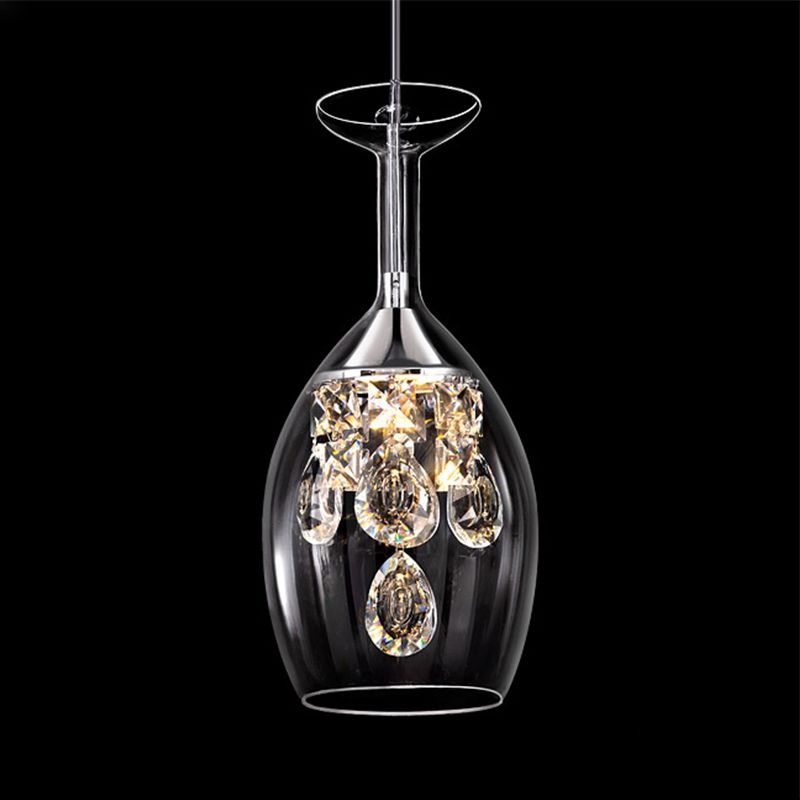 Close-up of the elongated Kristy wine-glass-shaped shade, narrow stem and faceted drops against a black background.