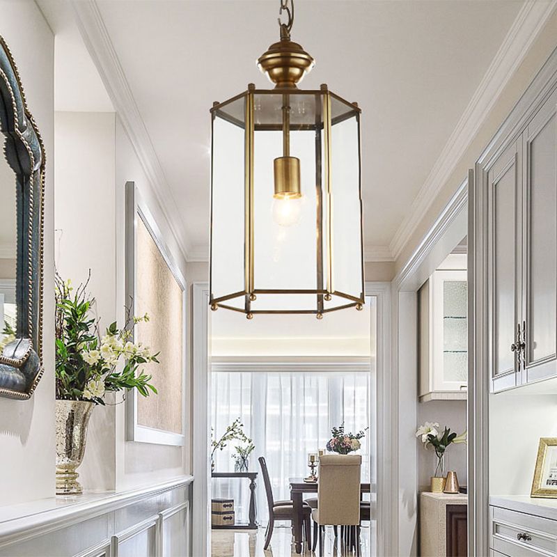 Clear-glass Sanna lantern pendant in a bright traditional hallway.