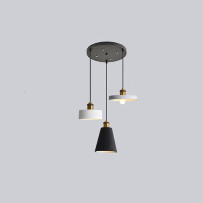 Morandi three-head cluster on a round ceiling plate with drum, tapered and disc shades.