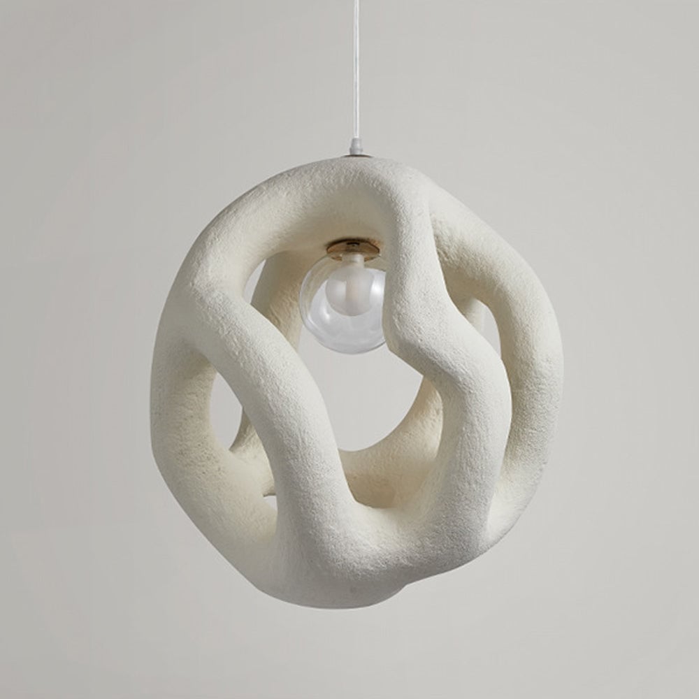 Unlit white textured openwork pendant with visible bulb and gold-tone holder isolated on gray