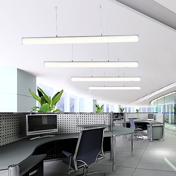 Several horizontal tube pendants above office desks