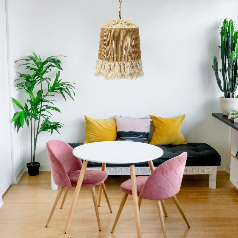 Tall tapered rope pendant above small living-room table