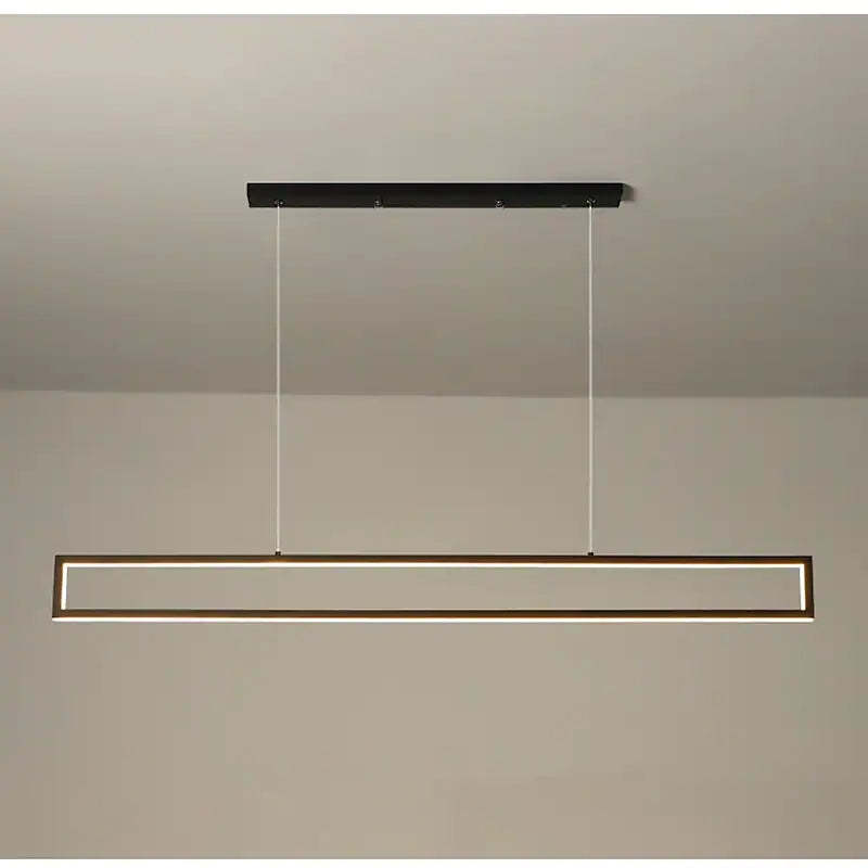 Edge illuminated rectangular pendant against a pale wall