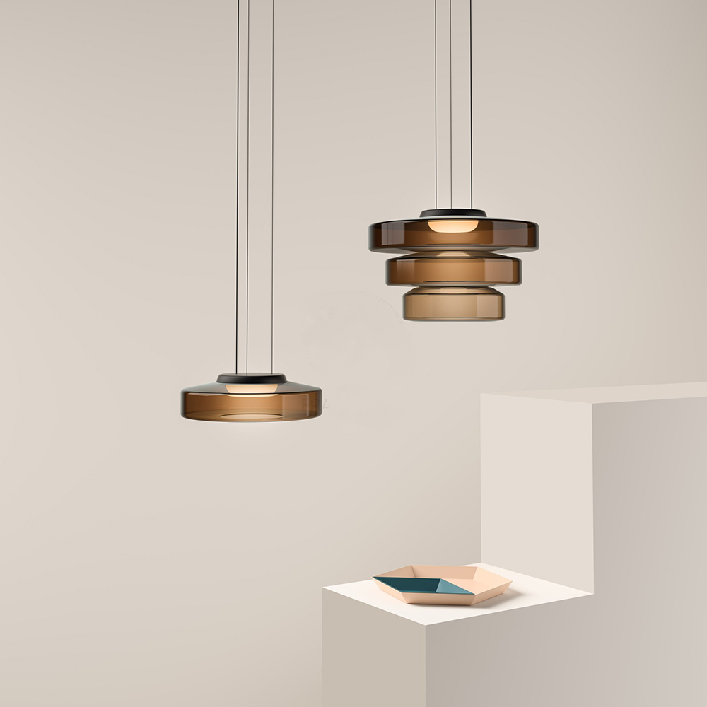 Amber pendants of one, two and three layers displayed together