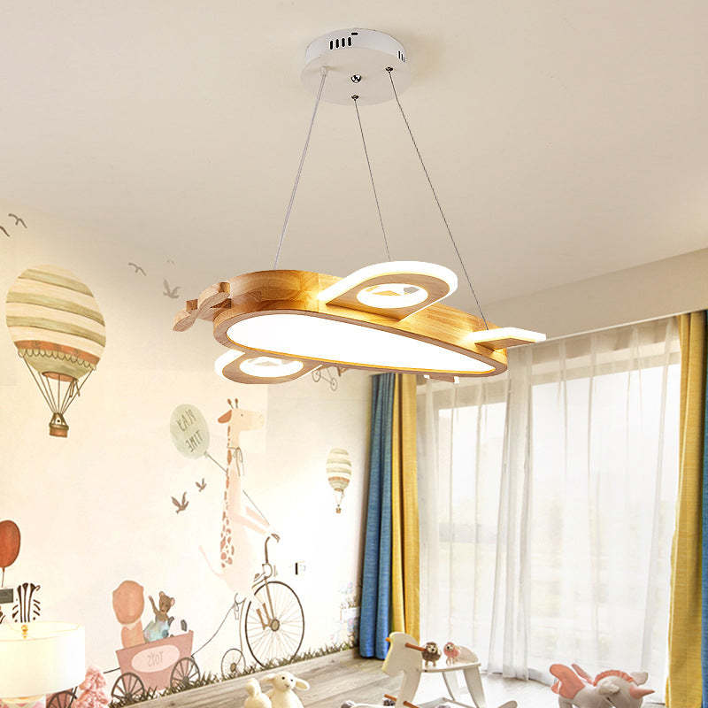 Airplane pendant in a room with balloon and animal murals, colourful curtains and a rocking horse