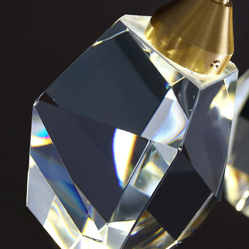 Close view of Kristy polished crystal facets and gold upper fitting