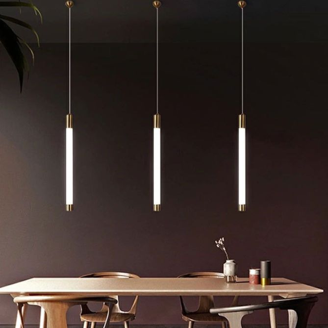 Three Edge vertical light bars above a dining table