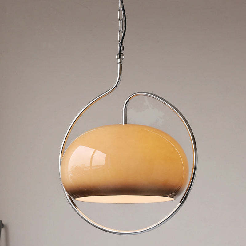 Front view of Hailie brown shade inside its curved loop frame.