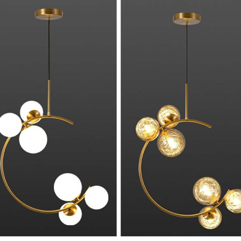 Comparison of white and clear six-globe crescent pendants with black suspension cords