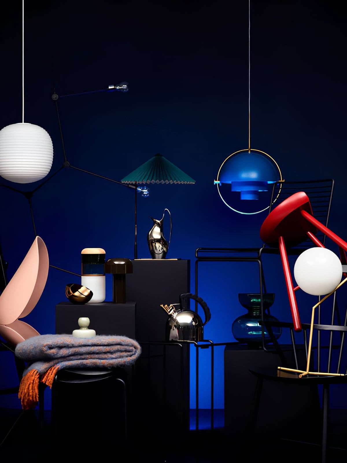 Blue ring-framed pendant in a dark colour-themed display