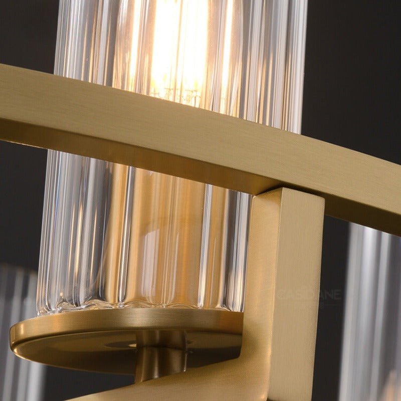 Ribbed glass cylinder on gold-tone metal ring detail