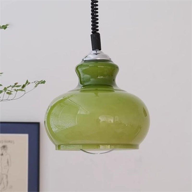 Close view of green glass dome and stepped neck