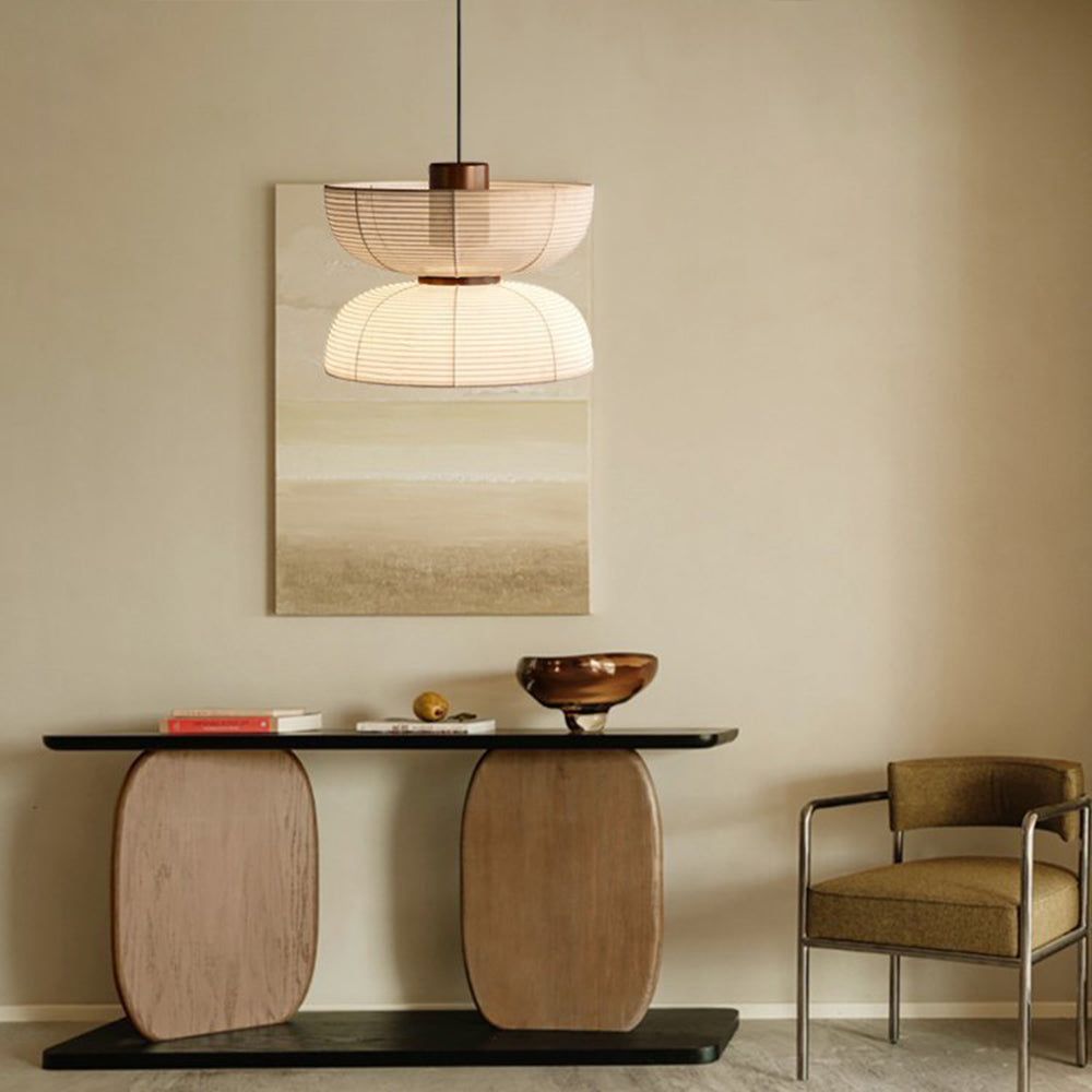 Ozawa bowl-over-dome pendant above a low console table
