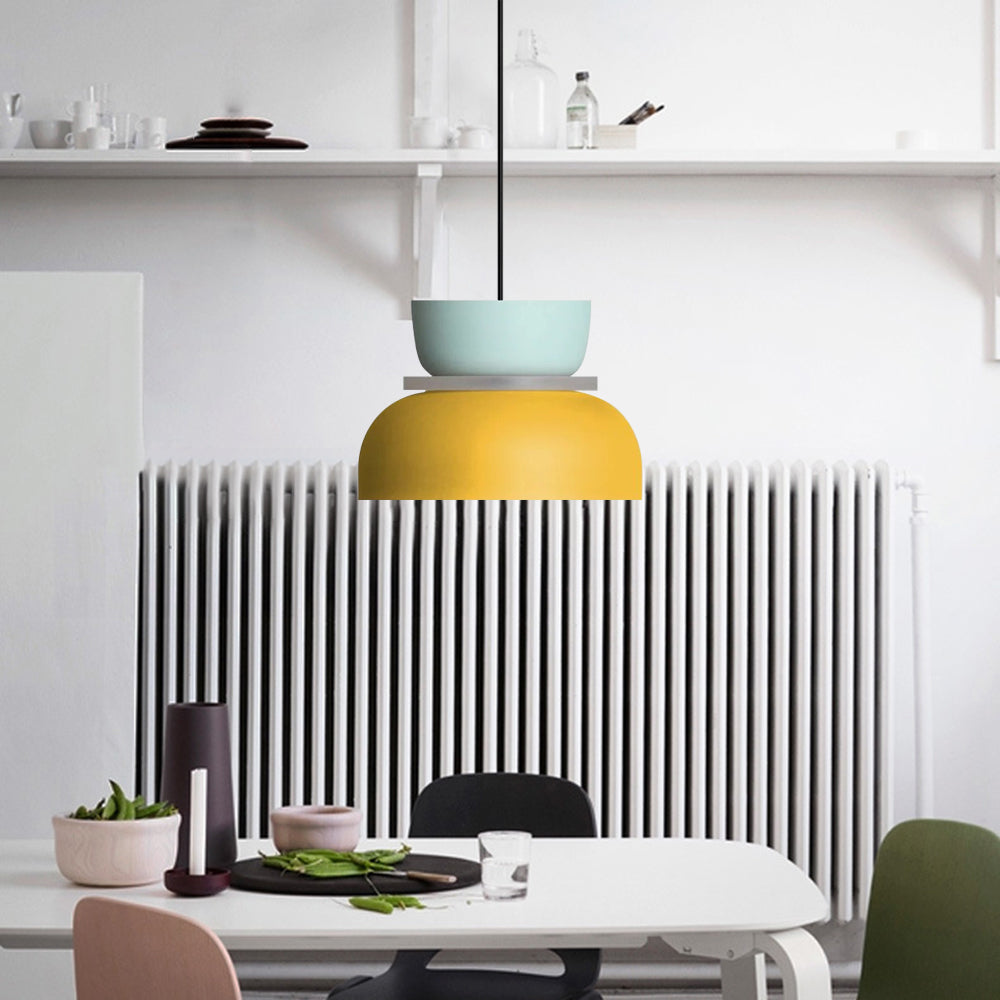 Morandi Blue Yellow pendant with a pale blue-green upper bowl and broad yellow dome against a white dining-room background