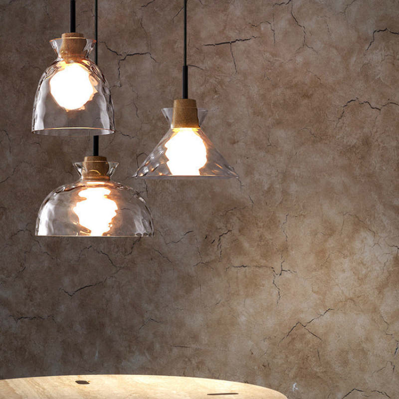 Three Levy glass shade styles above a table