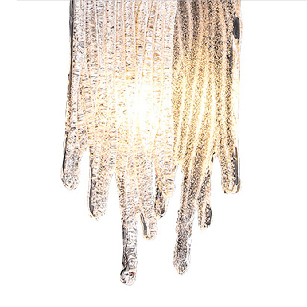 Front close view of the pendant’s lower crystal tips and glowing centre on white