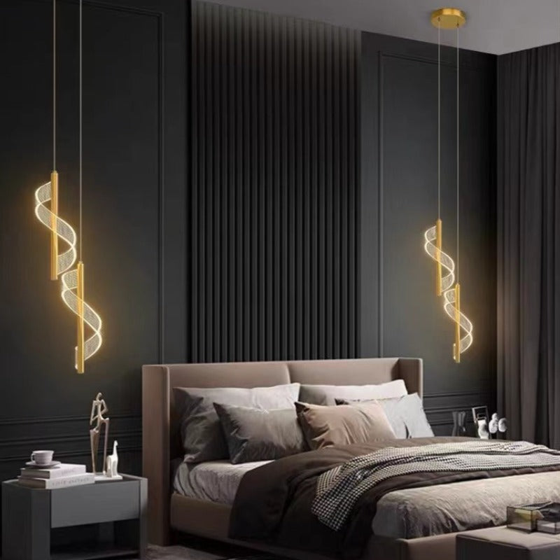 Paired Sanna ribbon arrangements flanking a bed in a dark room.
