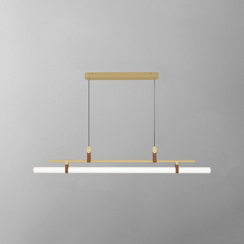 Gold Edge pendant isolated on gray, with an elongated canopy, parallel bar and white tube diffuser linked by brown details