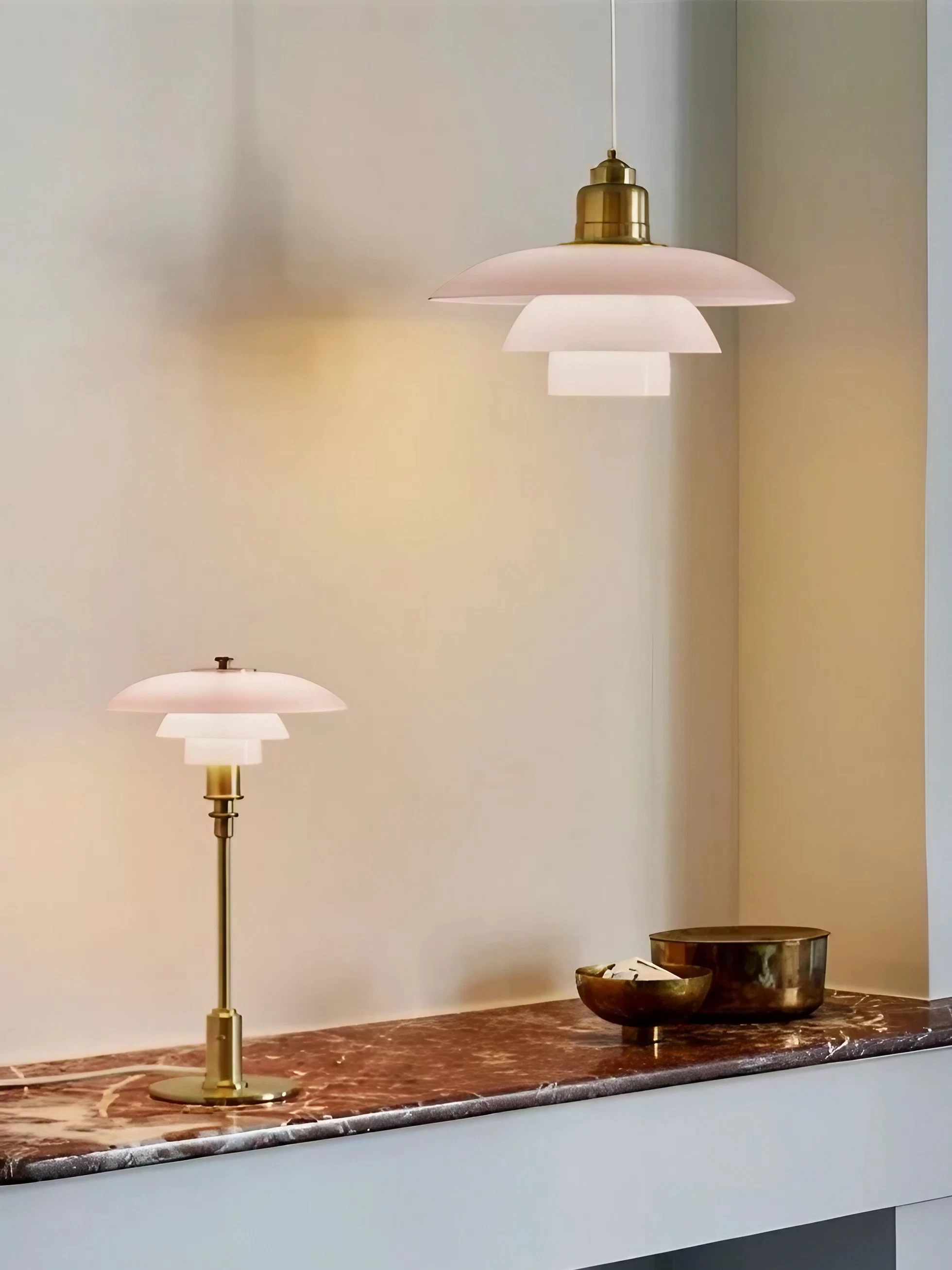 Opal disc pendant hanging above a sideboard with a separate table lamp
