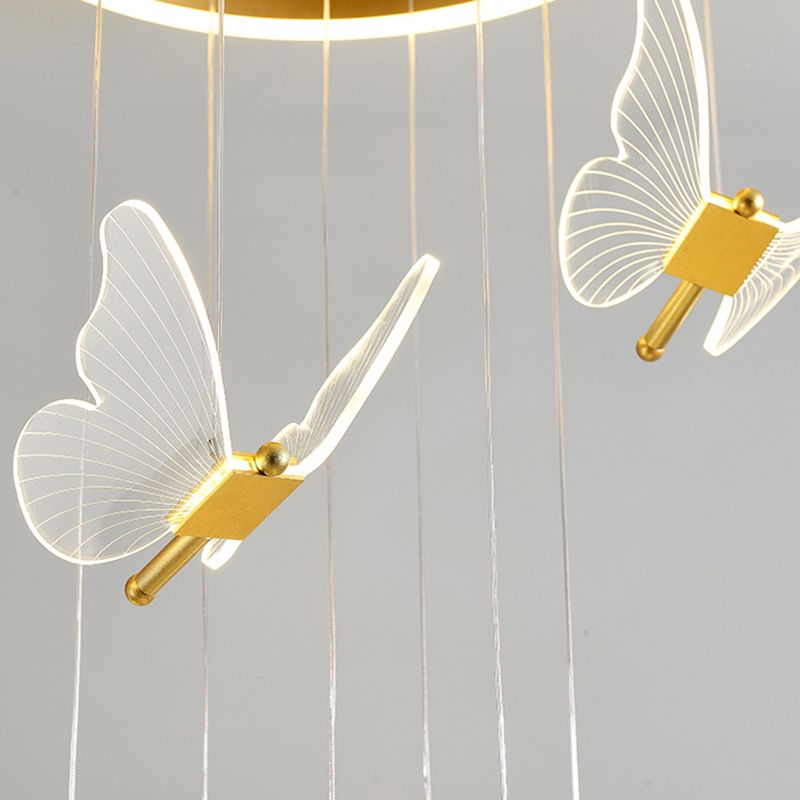 Close small group of clear butterfly wings under gold canopy