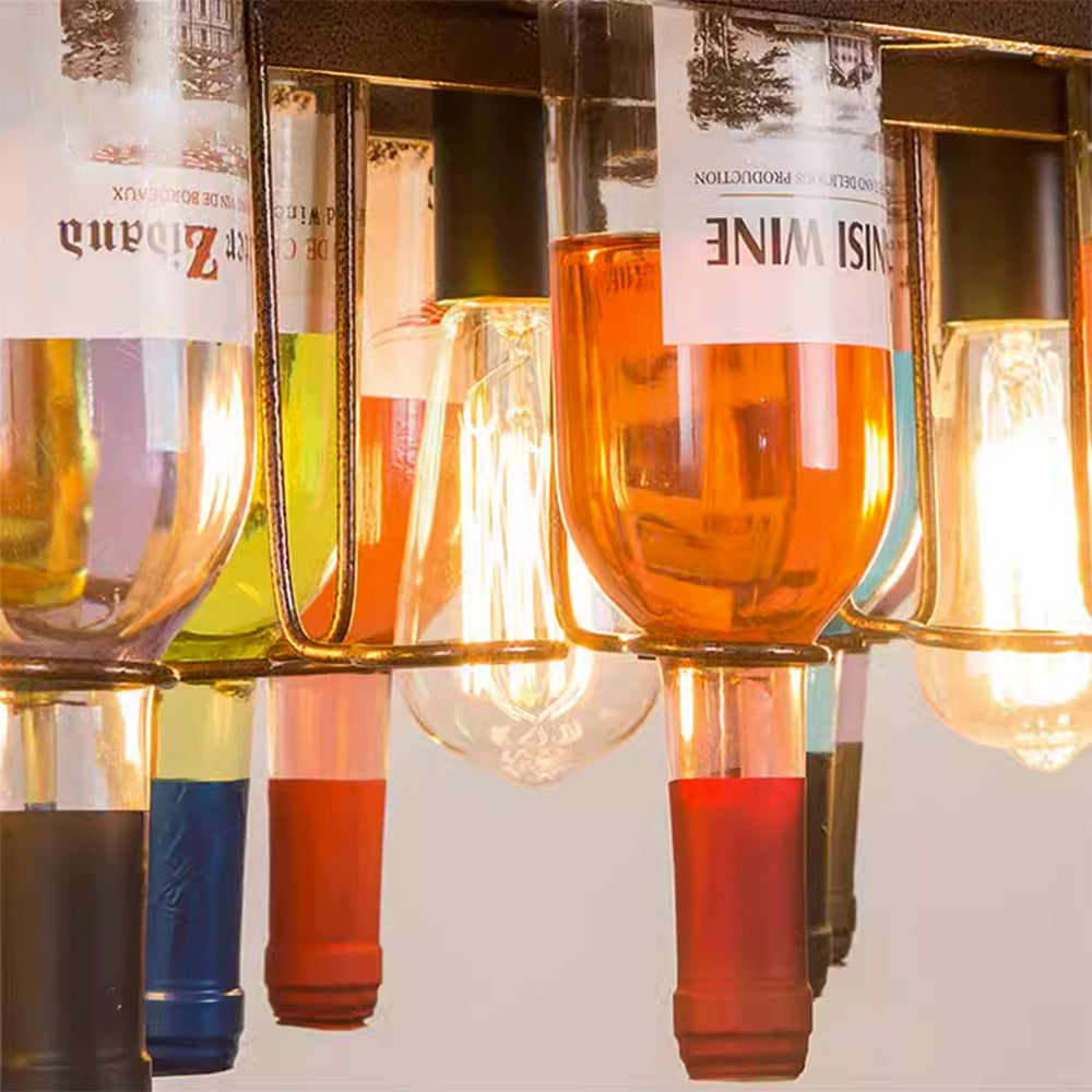 Close view of inverted coloured bottles and exposed glowing bulbs on Hailie.