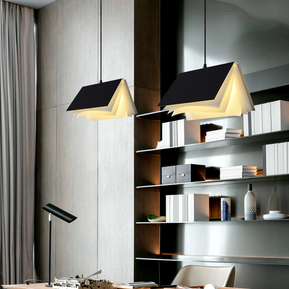 Black book pendants above a work desk