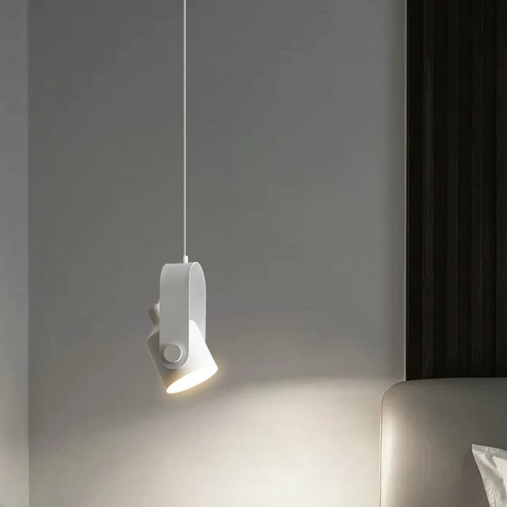Plain white pendant spotlight angled toward bedside wall