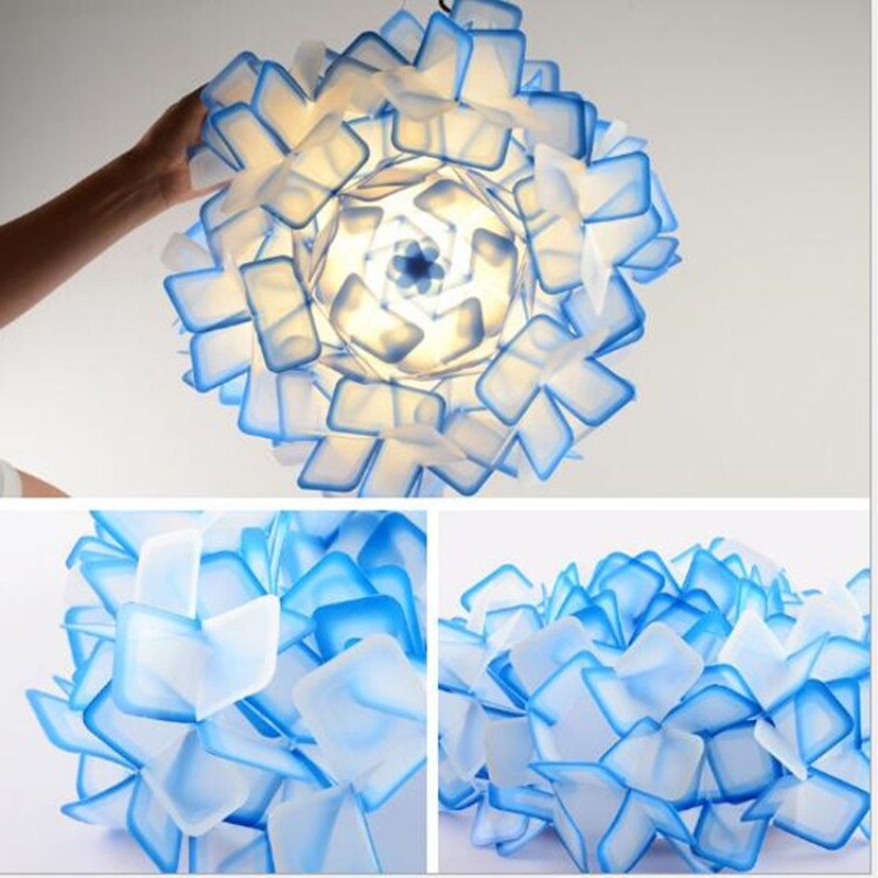 Blue Bella underside and petal closeups showing overlapping translucent acrylic pieces and a central circular fitting