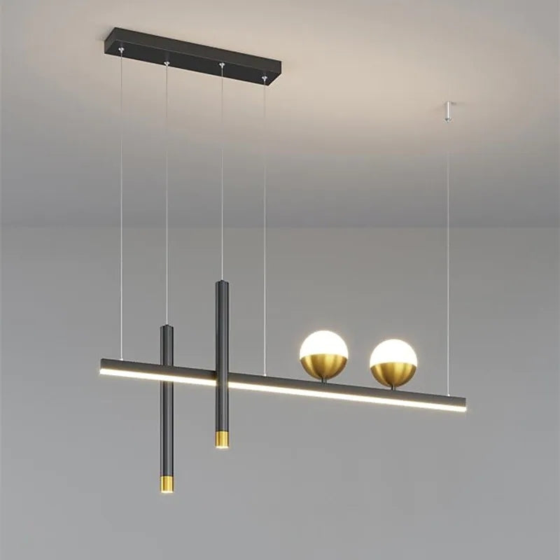 Angled view of Madina suspended bar, globes and vertical light cylinders.