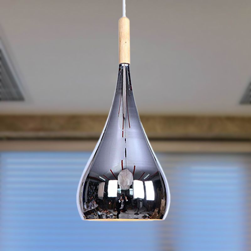 Detail of the reflective Avi Chrome teardrop pendant