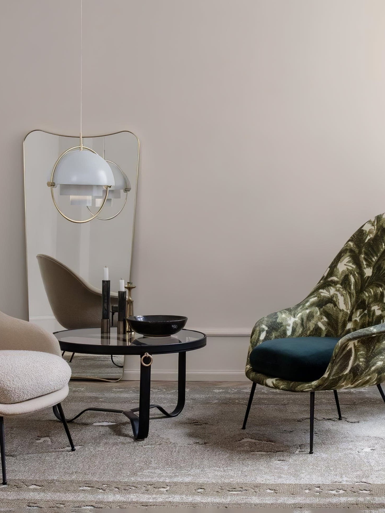 White dome pendant over a small living-room table