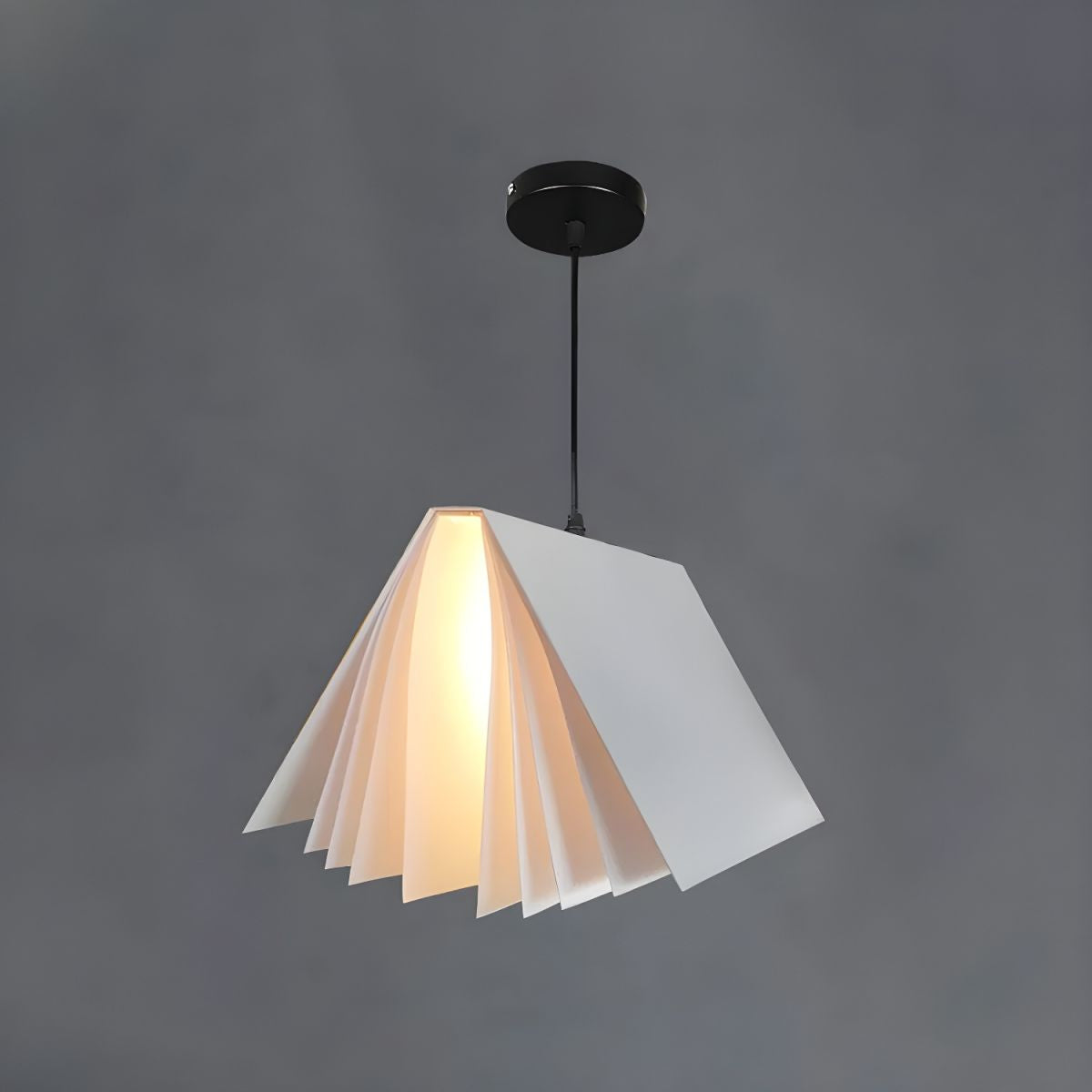White book-shaped pendant against grey background