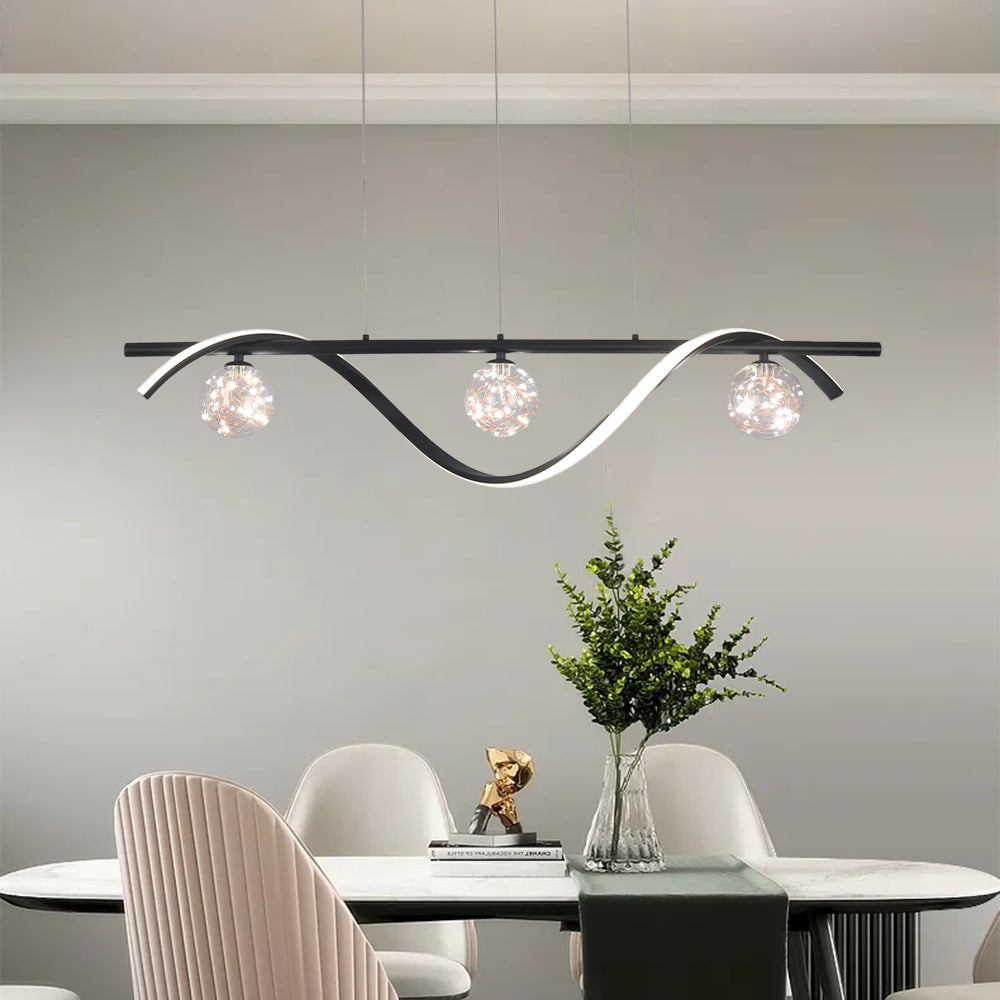 Black glass-globe pendant above a round dining table