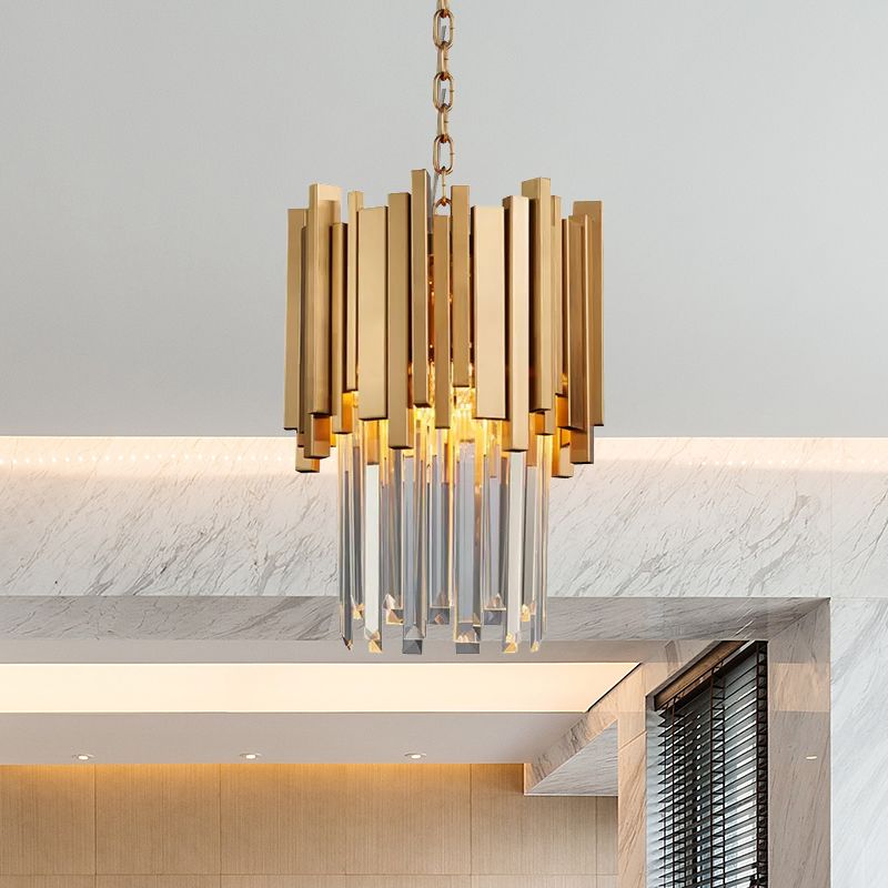 Close view of the gold pendant and clear crystal rods