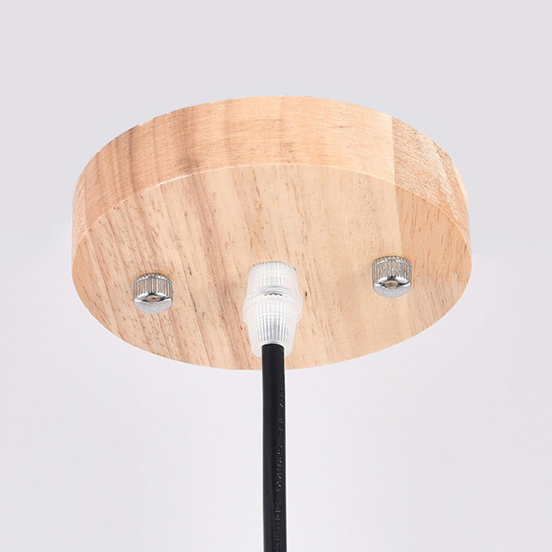 Round wood-toned Samuels ceiling fitting with visible fasteners and black cord.