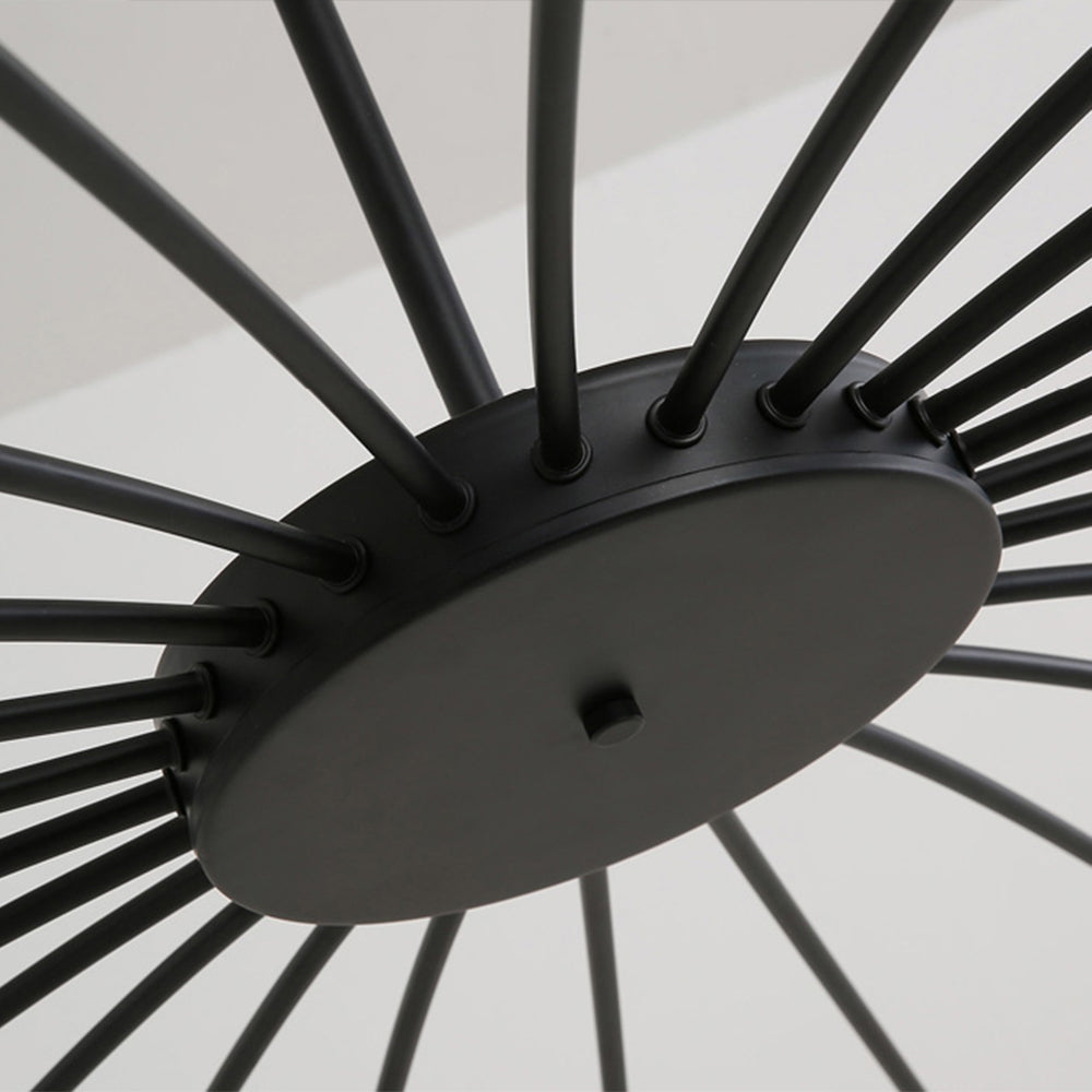 Close-up of Evette Black circular hub with thin arms radiating from its rim