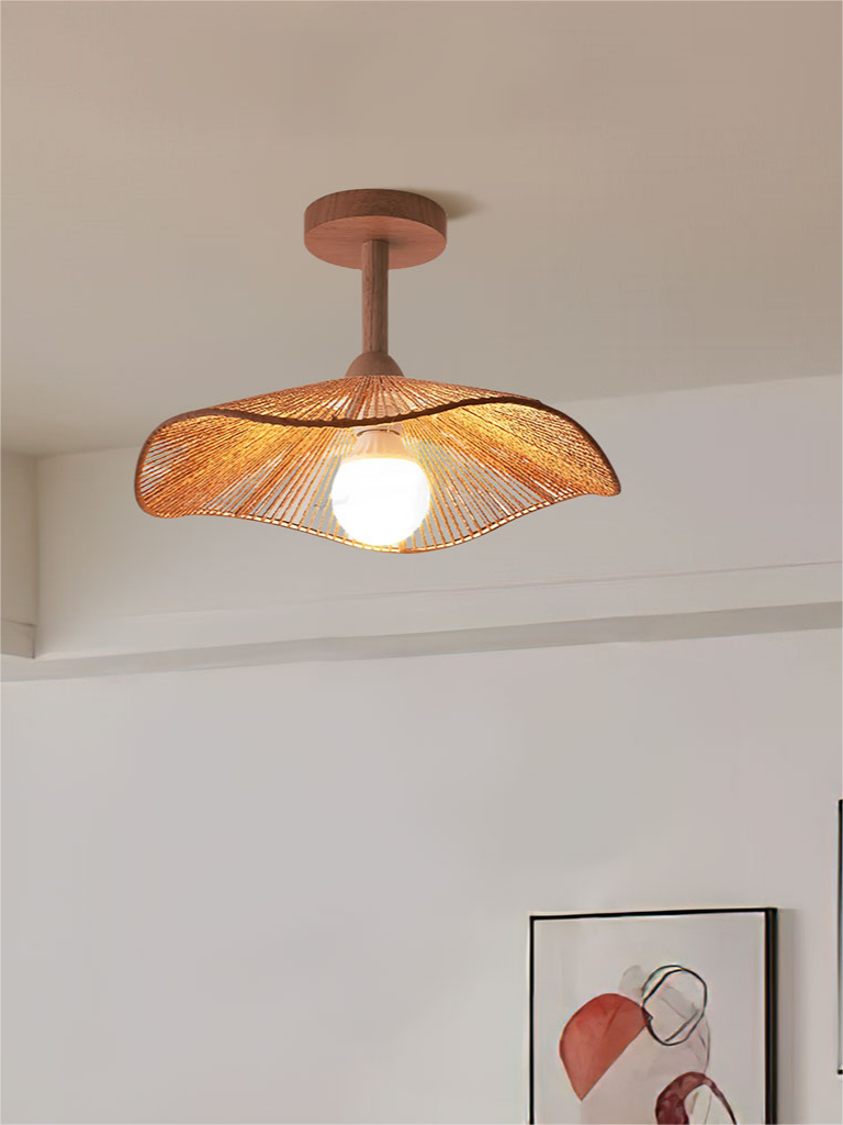 Hazel wood-tone ceiling lamp above framed abstract wall art.