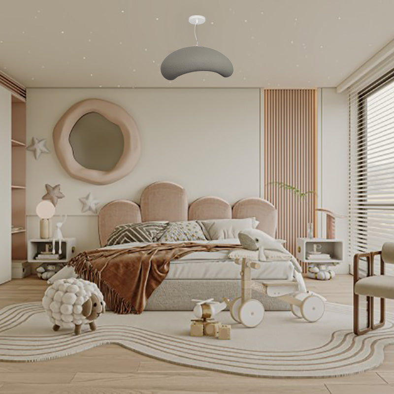 Gray Byers pebble pendant above a bedroom.